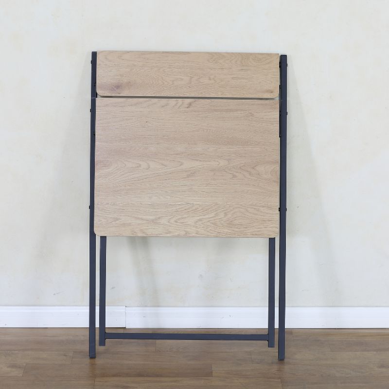 Escritorio plegable compacto de madera y metal con repisa superior